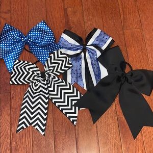 Variety of blue black and white bows.